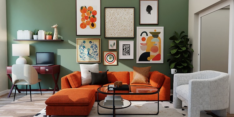 orange and black sofa with throw pillows