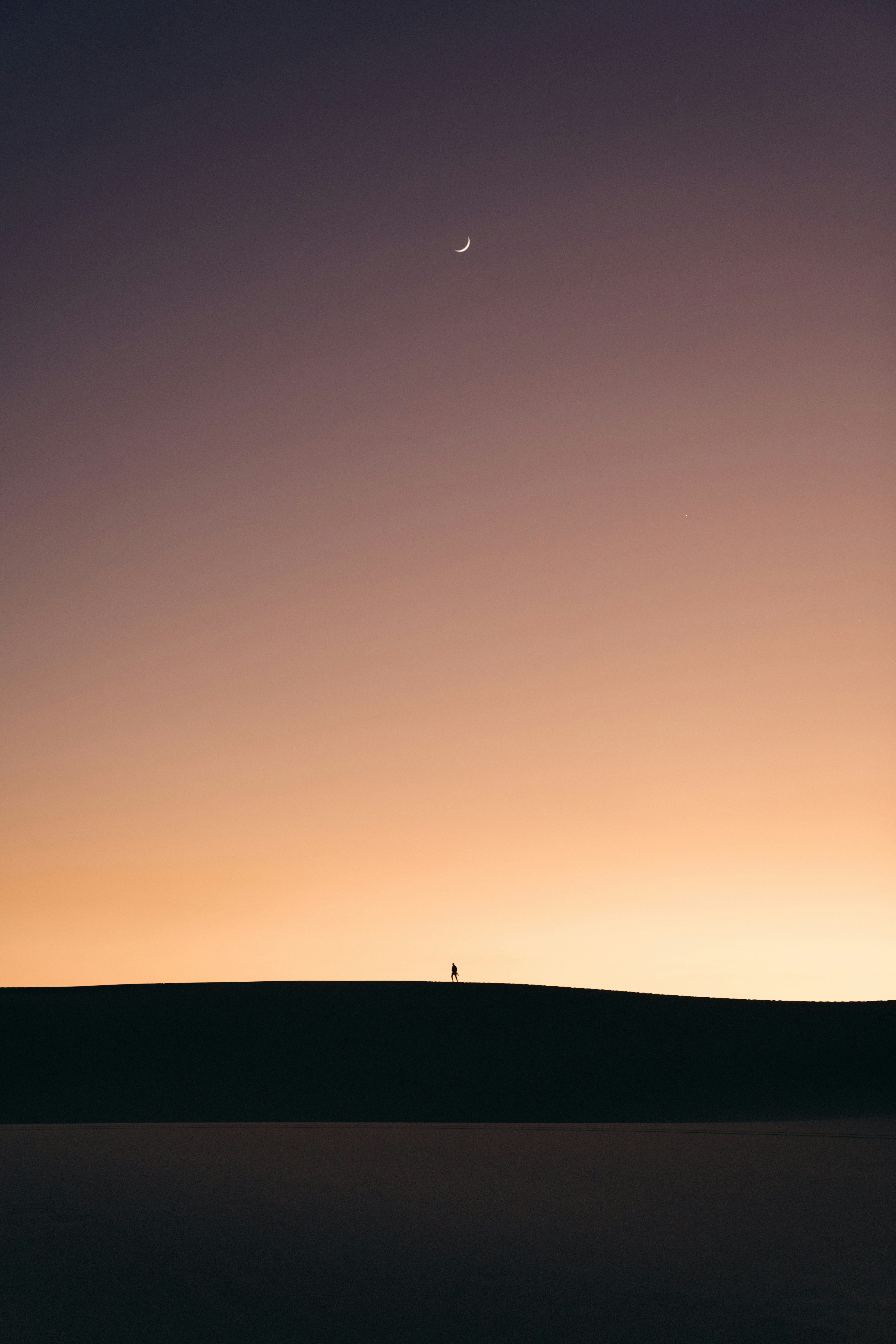 This photo took a lot of effort from my friend up there to get up the dune so i can have him in the pictures as a human element, anyhow, i'm happy it came out the way it did showing how insanely huge and beautiful the desert is compared to us humans.