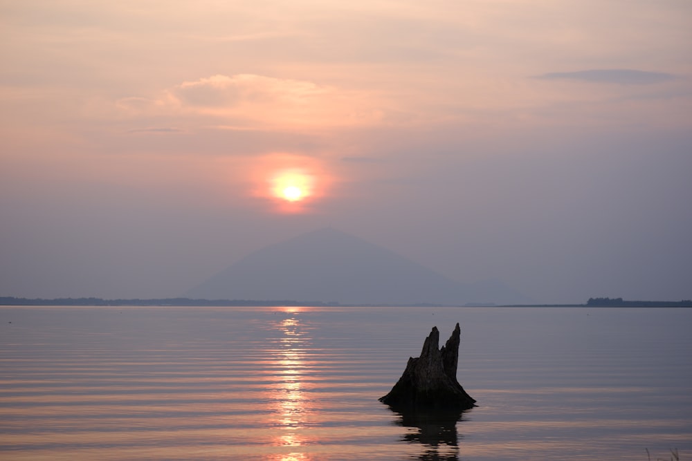 silhouette of mountain during sunset