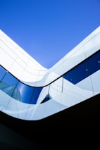 white concrete building under blue sky during daytime