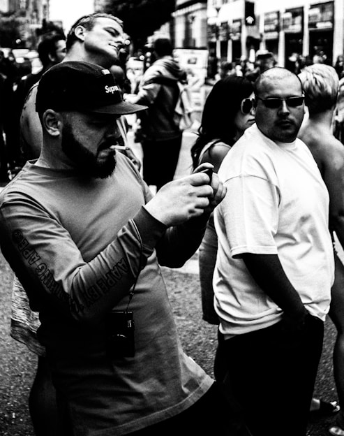 A candid shot of Daanveer engaging with people in a bustling Indian street, capturing genuine interactions and moments of social connection.