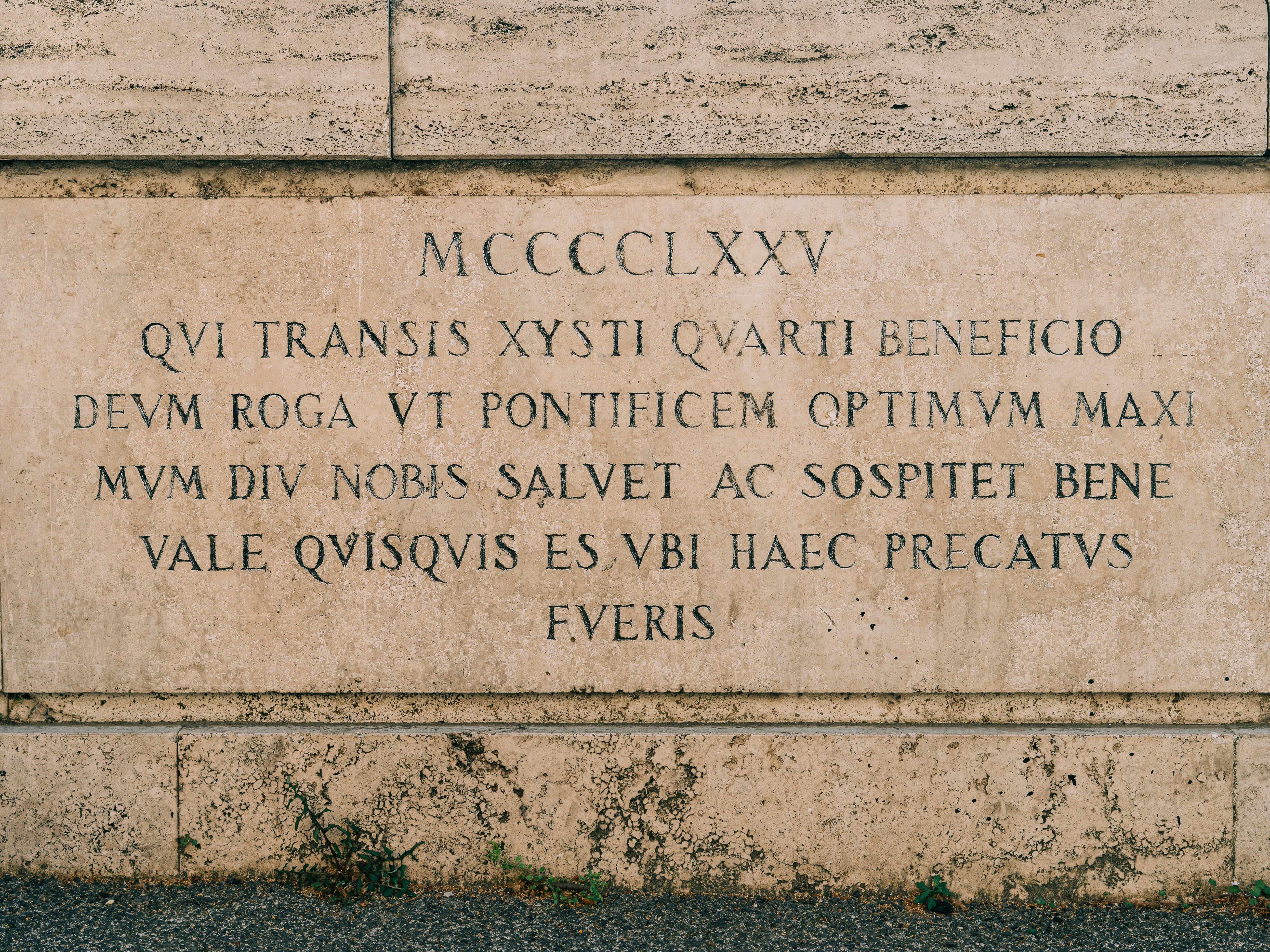 Marble inscription in Latin, dated 1475, located at the beginning of Ponte Sisto bridge in Rome, Italy, commemorating Pope Sixtus IV