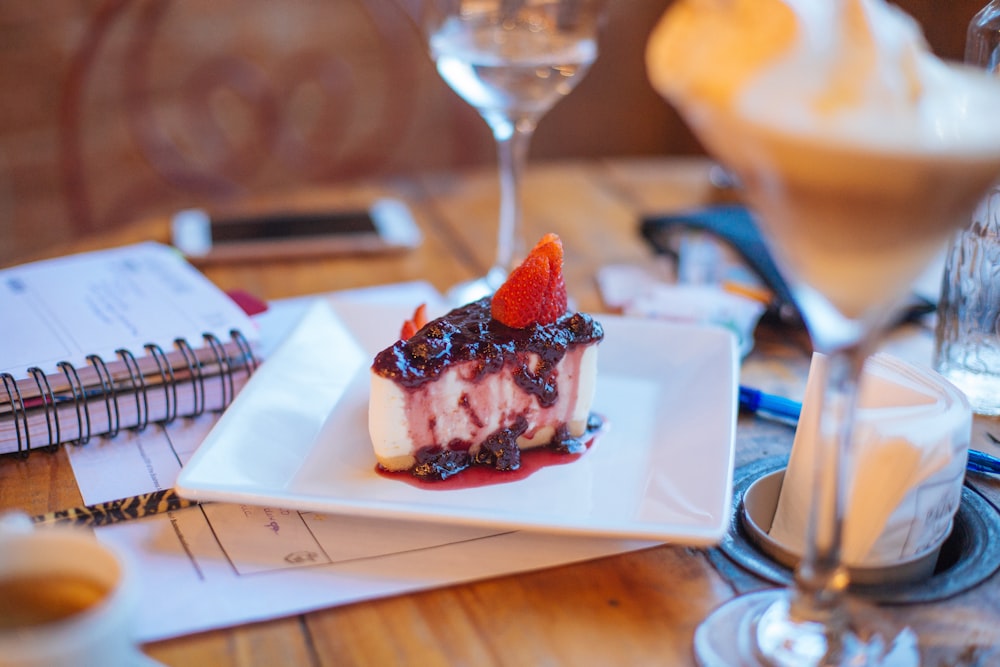 sliced cake on white ceramic plate