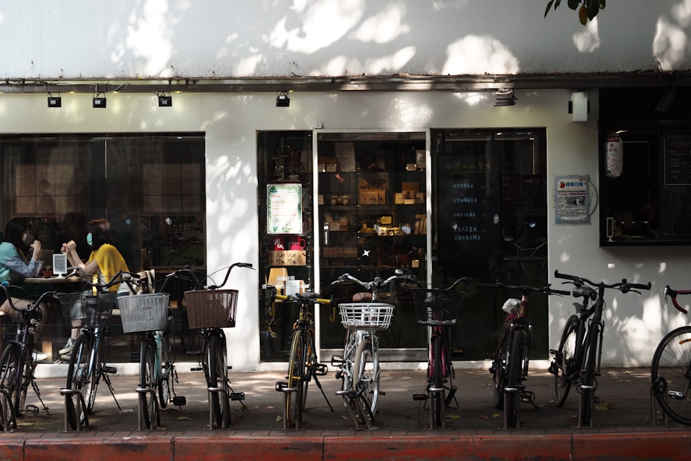 bicycles parked in front of store