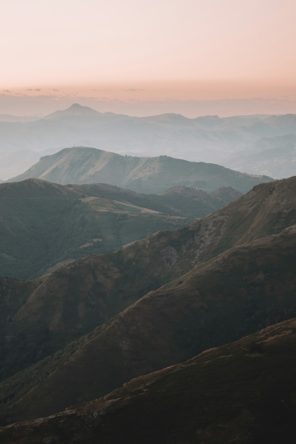 green and brown mountains under blue sky during daytime