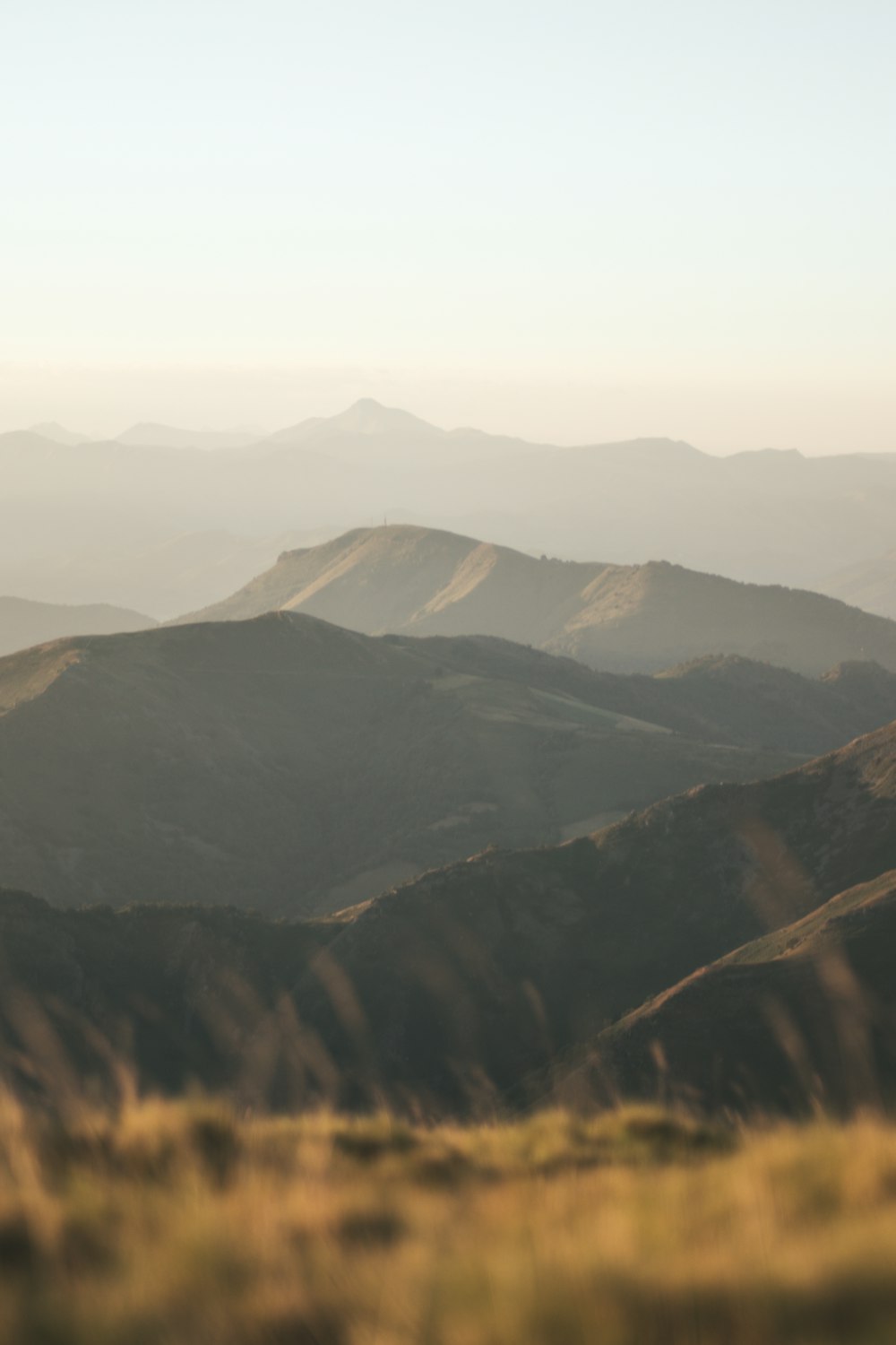 mountains under white sky during daytime