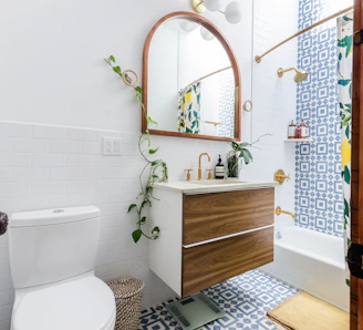 white ceramic toilet bowl beside white ceramic toilet bowl