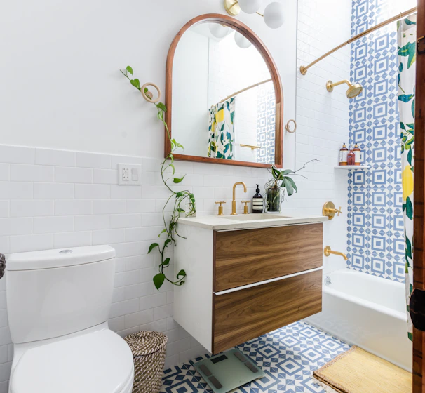 white ceramic toilet bowl beside white ceramic toilet bowl