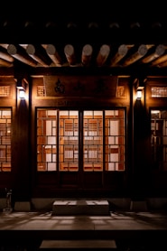 brown wooden door with glass panel