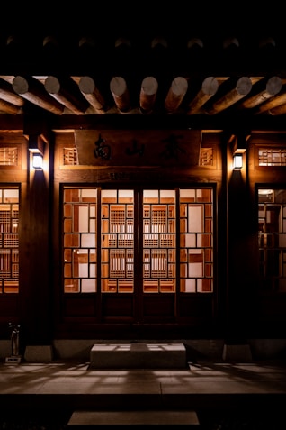 brown wooden door with glass panel