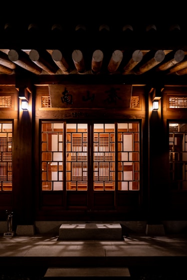 brown wooden door with glass panel