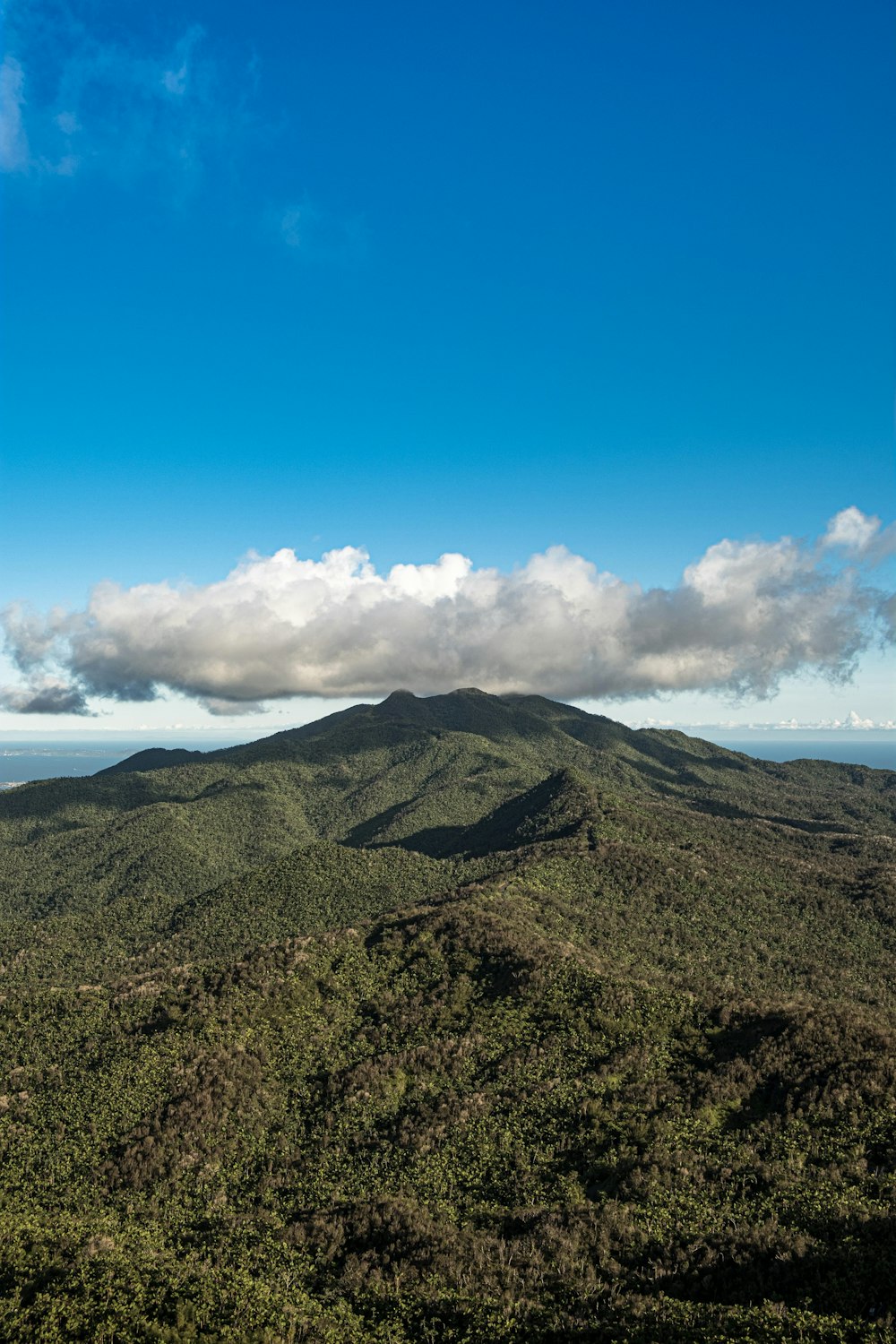 green mountain under blue sky during daytime