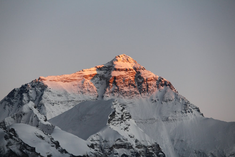 snow covered mountain under blue sky during daytime