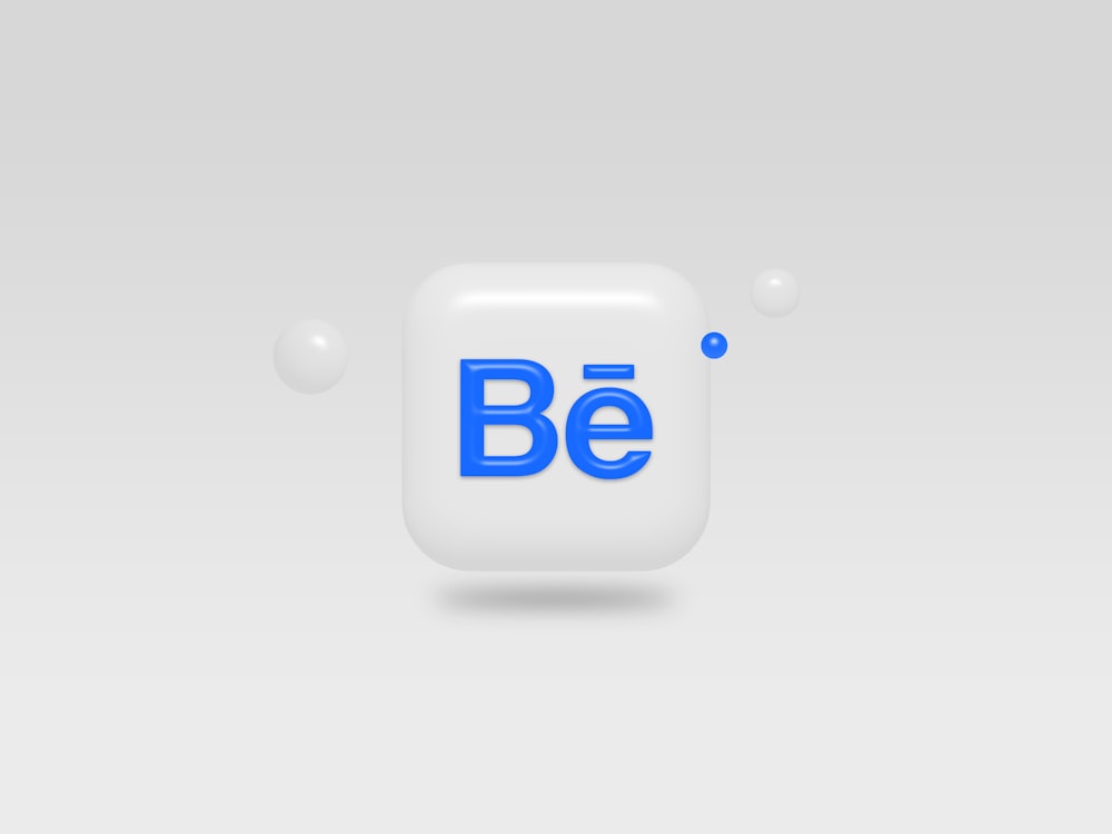 a white square with blue letters and bubbles