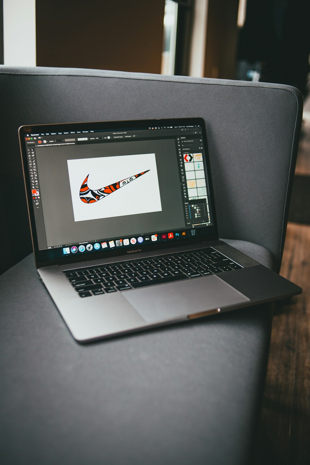 macbook pro on black table