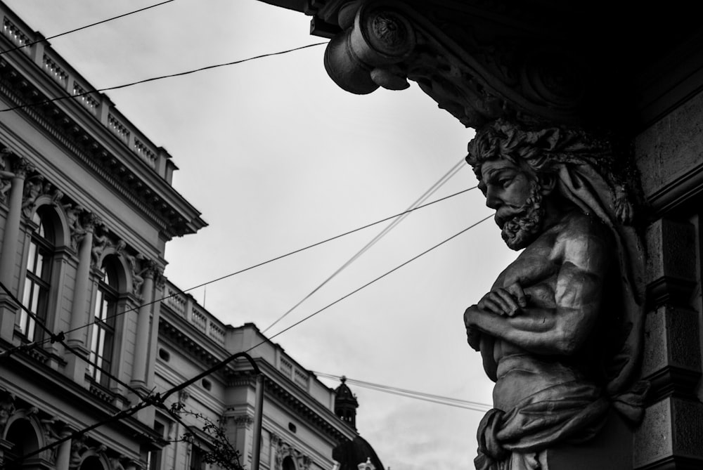 grayscale photo of angel statue