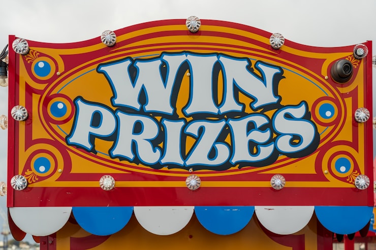 A win prizes sign on Promenade Pier, Paignton, U.K. 