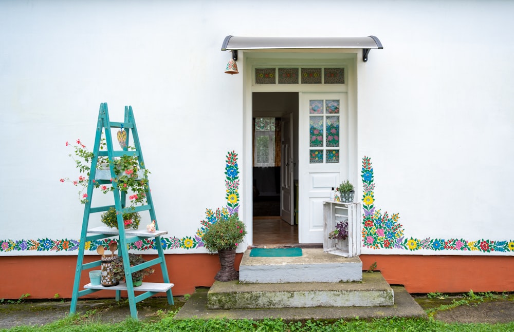 blue wooden door with white wooden frame