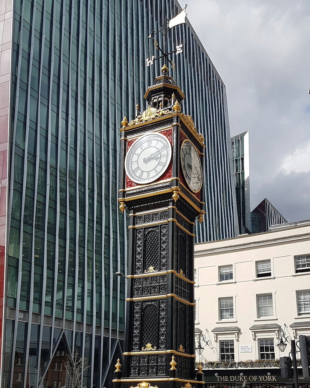 brown and black analog clock