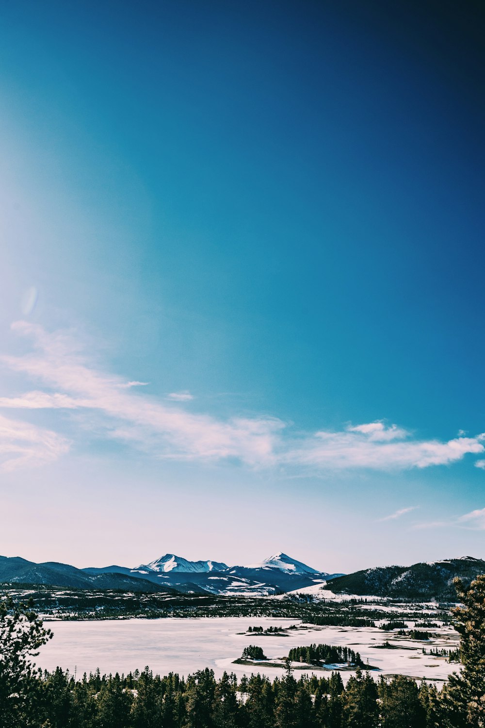 snow covered mountain under blue sky during daytime