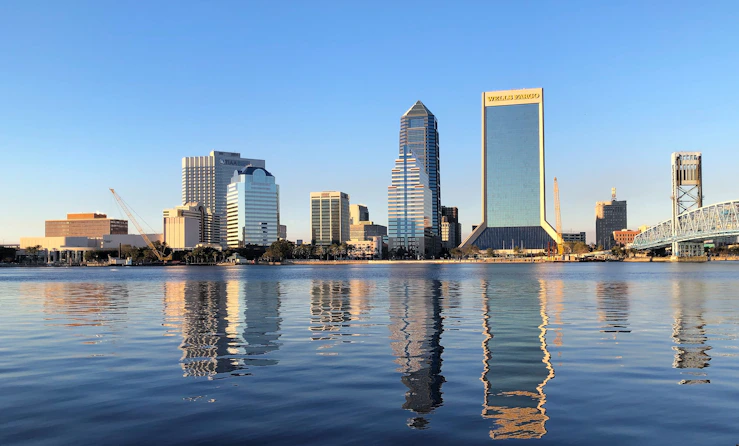 jacksonville, Florida skyline across body of water during daytime