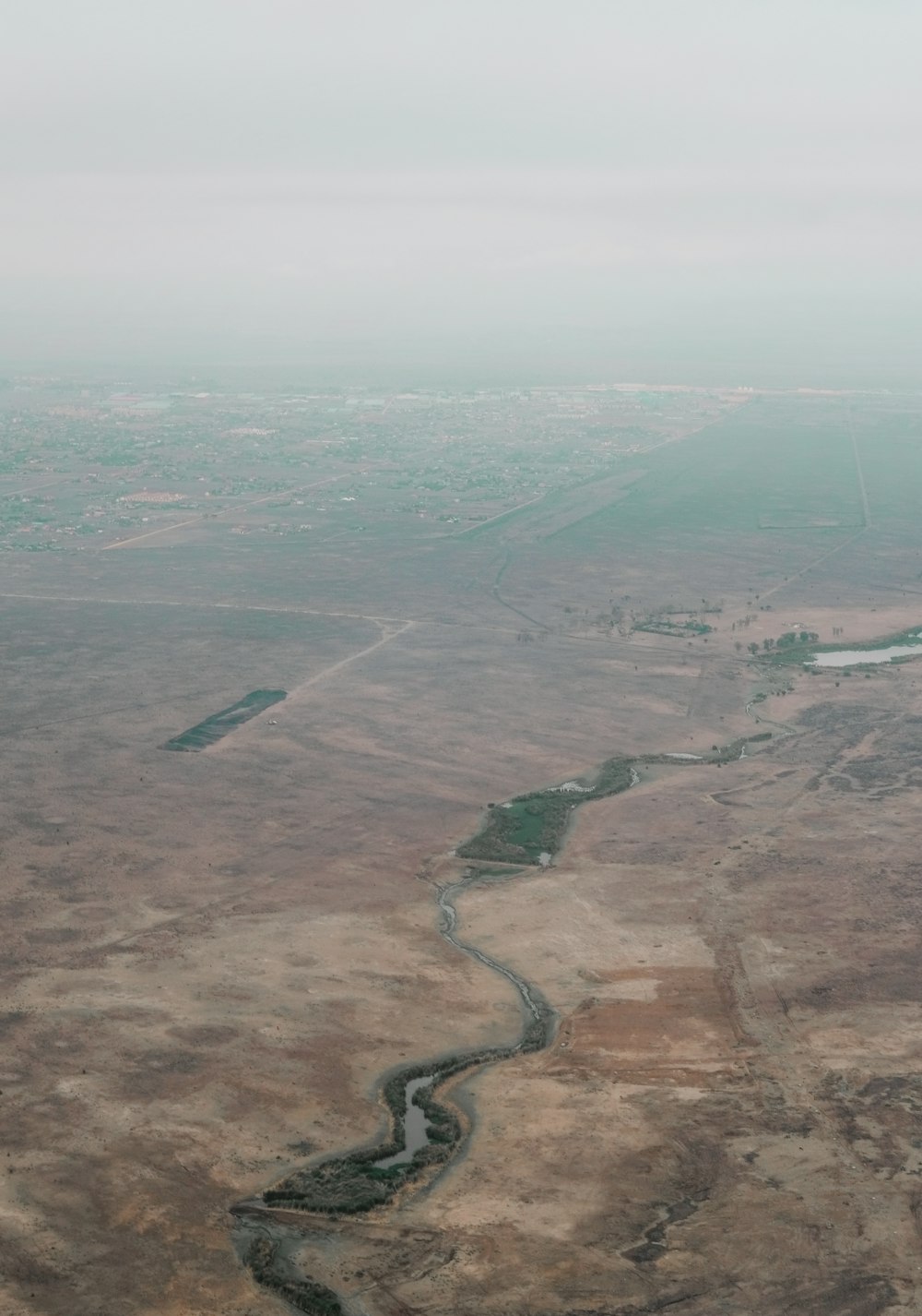 aerial view of green field during daytime