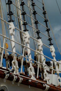 Close-up of rigging equipment securing a high-value cargo.