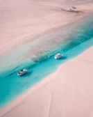 aerial view of white sand beach during daytime