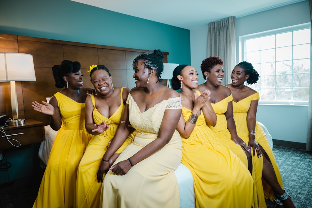 group of women in yellow dress