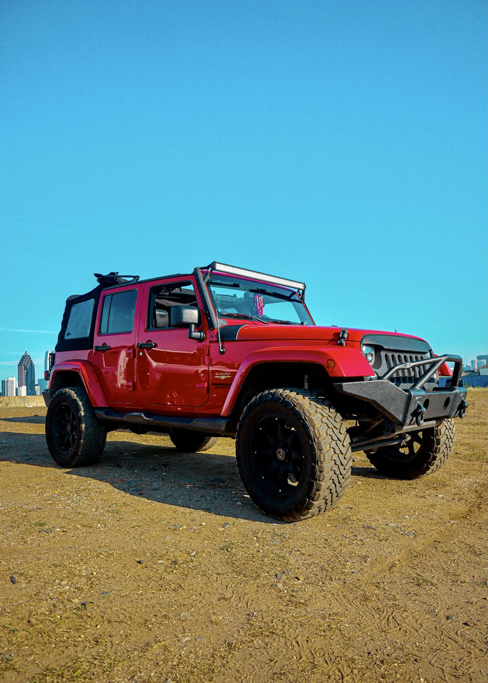 red and white jeep wrangler on brown sand during daytime photo – Free  Atlanta Image on Unsplash