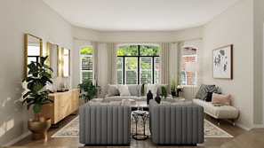 A freshly painted HDB living room with soft pastel walls and modern furnishings.