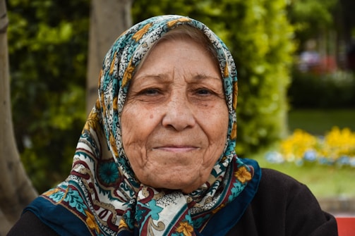 woman in blue white and brown hijab