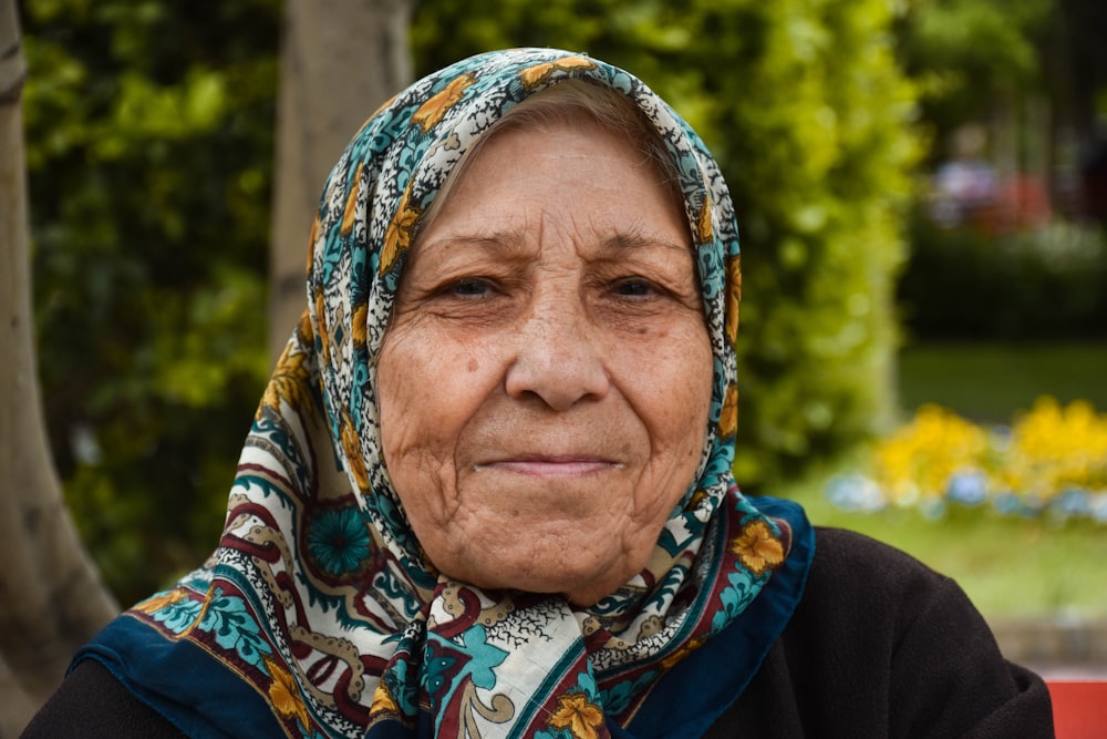 woman in blue white and brown hijab