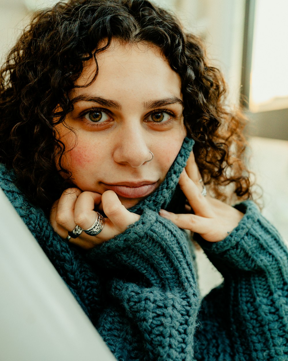 woman in blue knit sweater