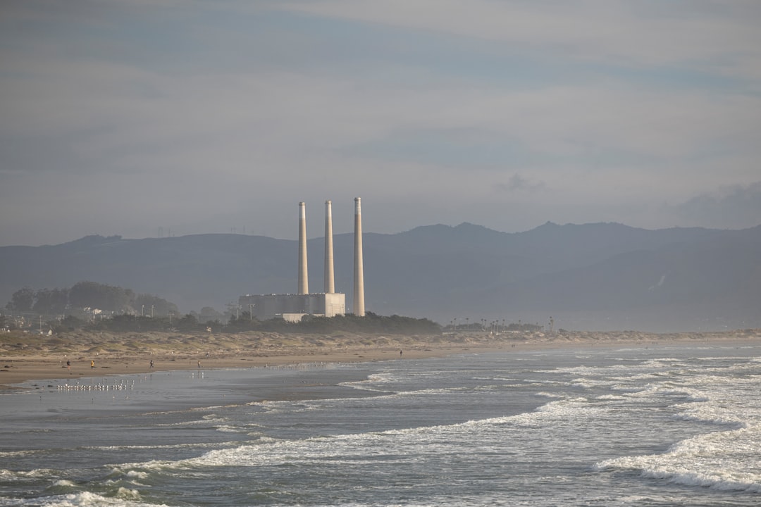 white towers on seashore during daytime
