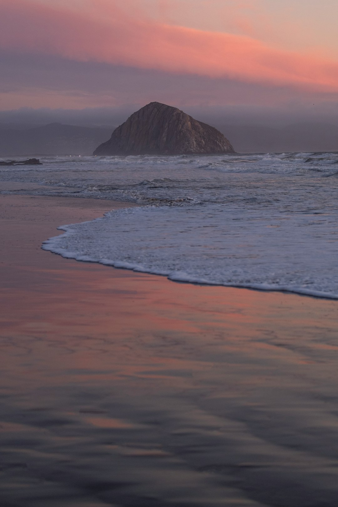 ocean waves crashing on shore during daytime