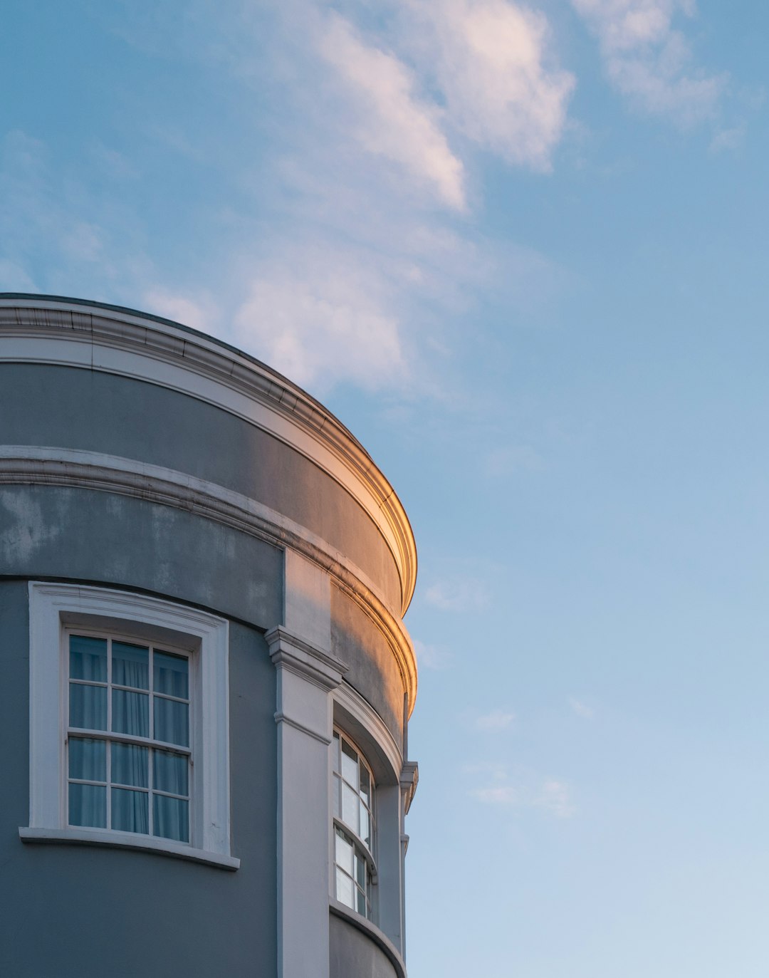 white concrete building under blue sky during daytime