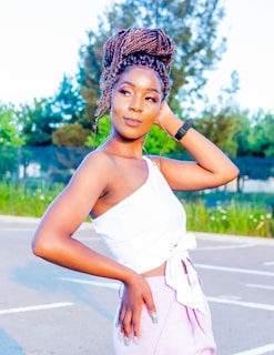 Natural textured braids styled into a chic half-up, half-down look