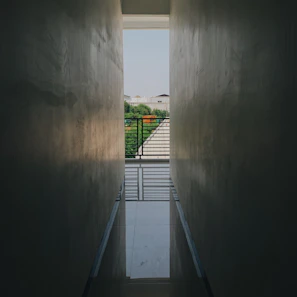 Common hallway in a multi-story apartment complex with polished floors