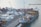 A cargo ship in a busy port, highlighting logistics operations.