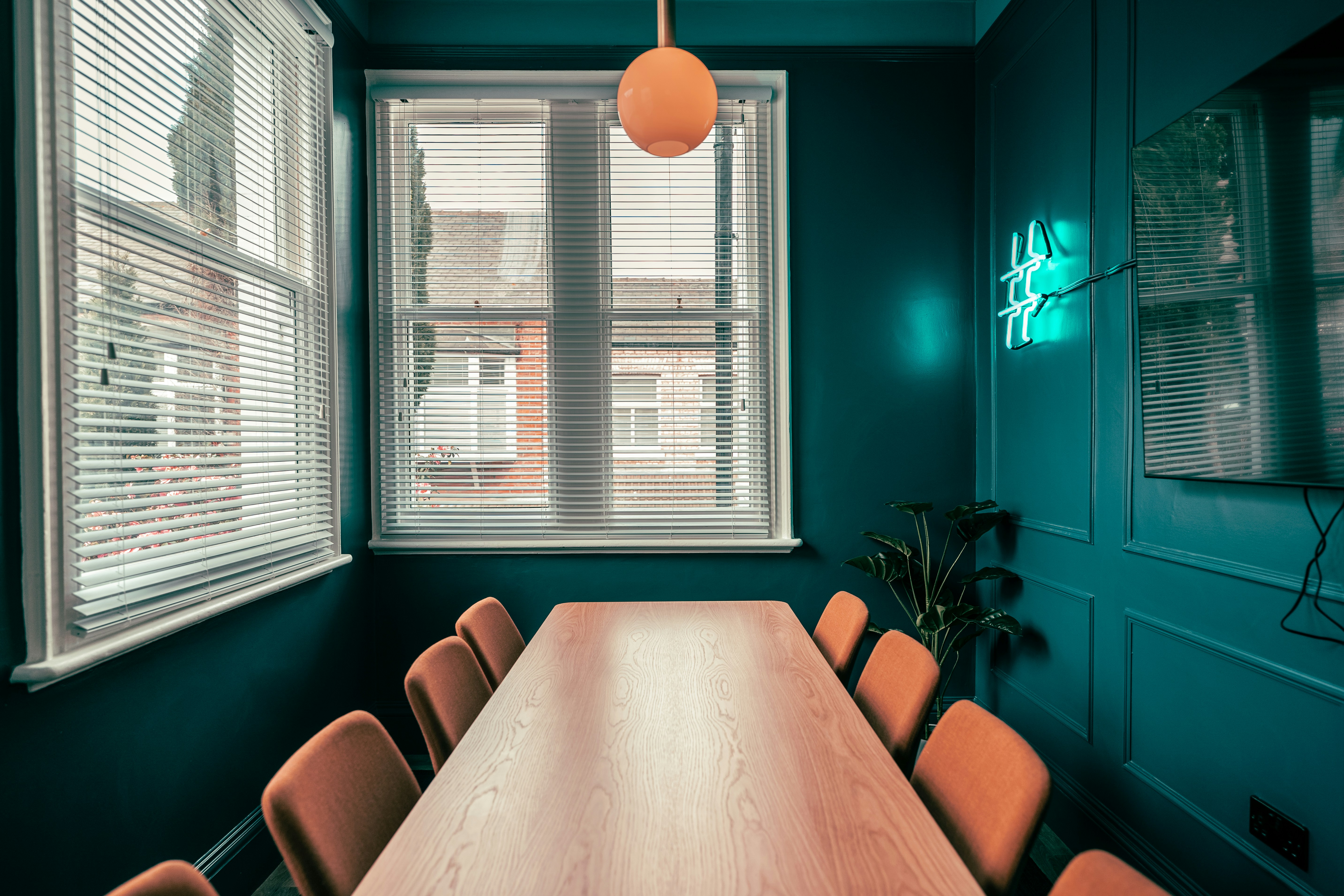 blue office brown wooden table with chairs