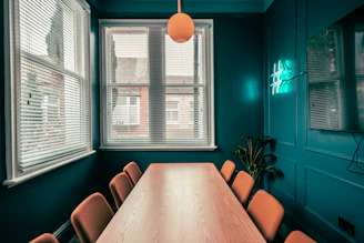 brown wooden table with chairs