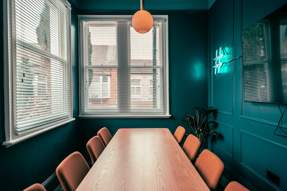 brown wooden table with chairs