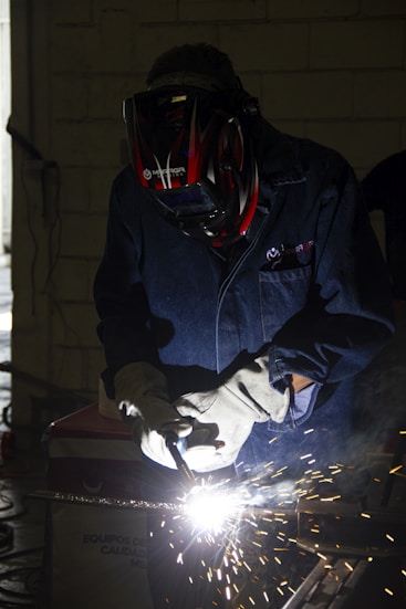 Welder in certified welding program