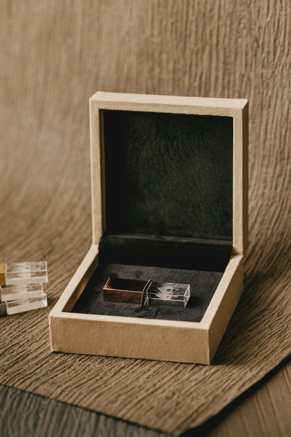 silver ring in brown box