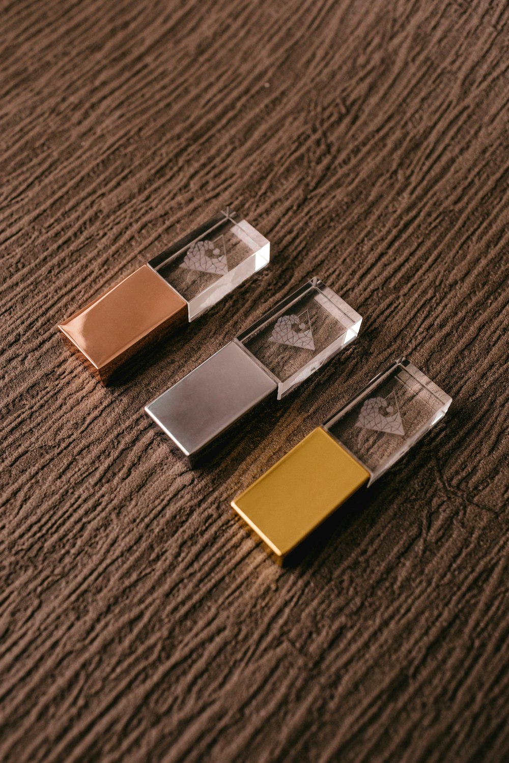 brown and silver flip top cigarette box