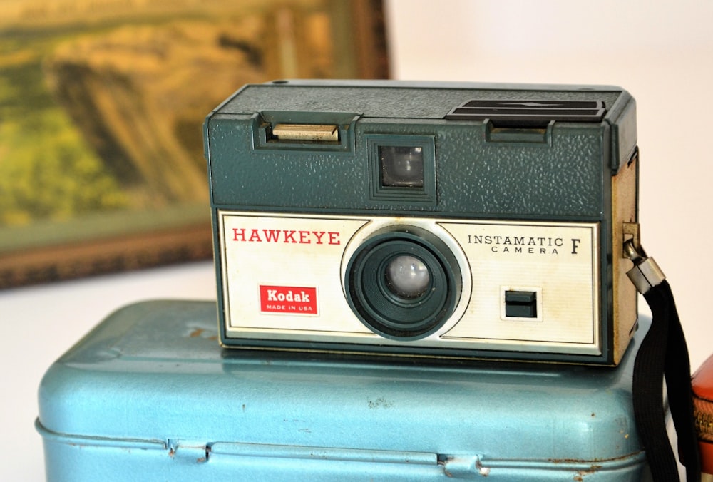 black and silver polaroid camera