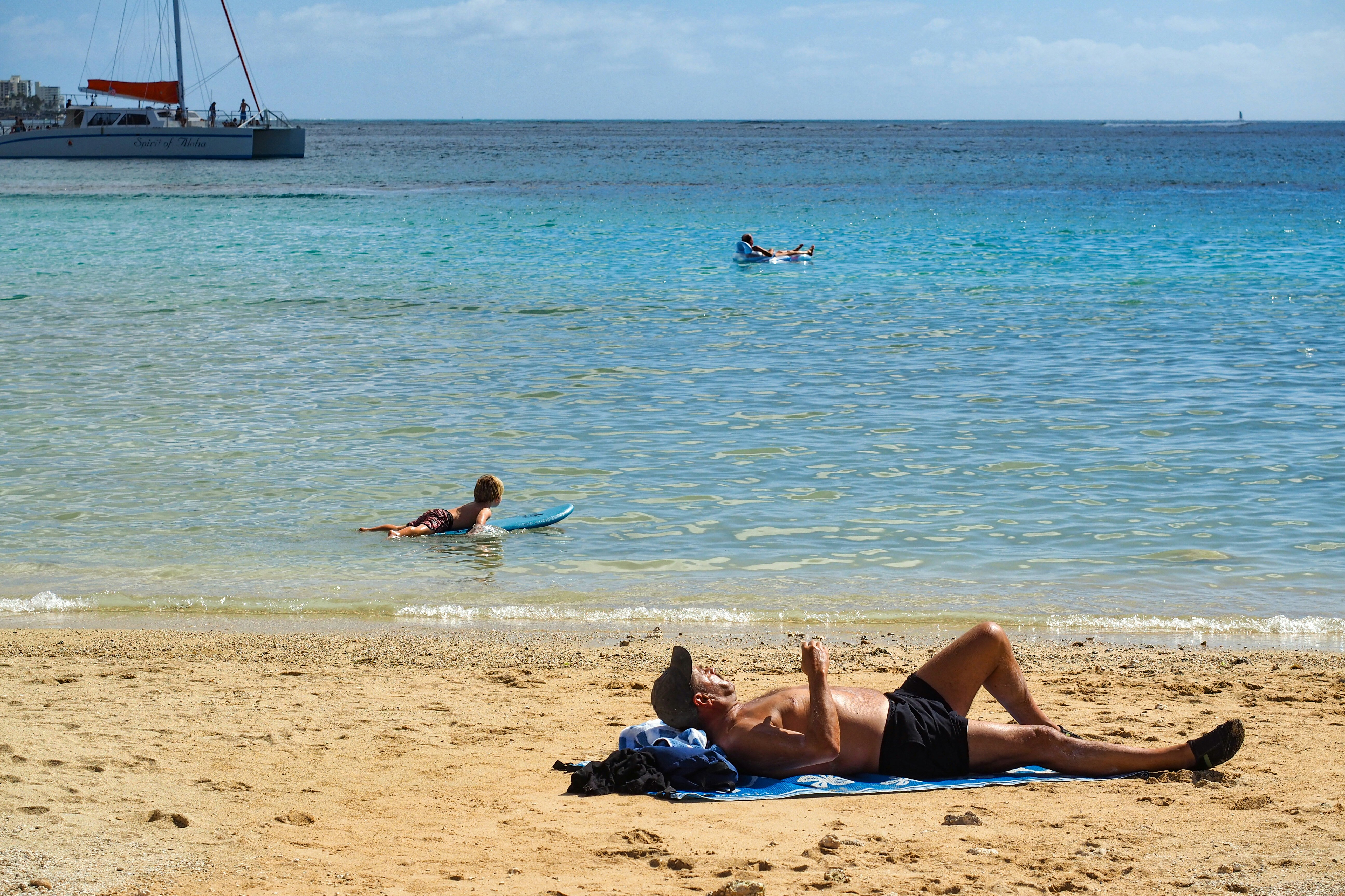 Woman in black bikini lying on beach sand during daytime photo – Free ...