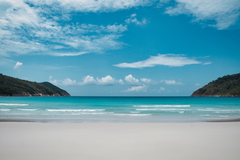 blue sky and white clouds over the sea