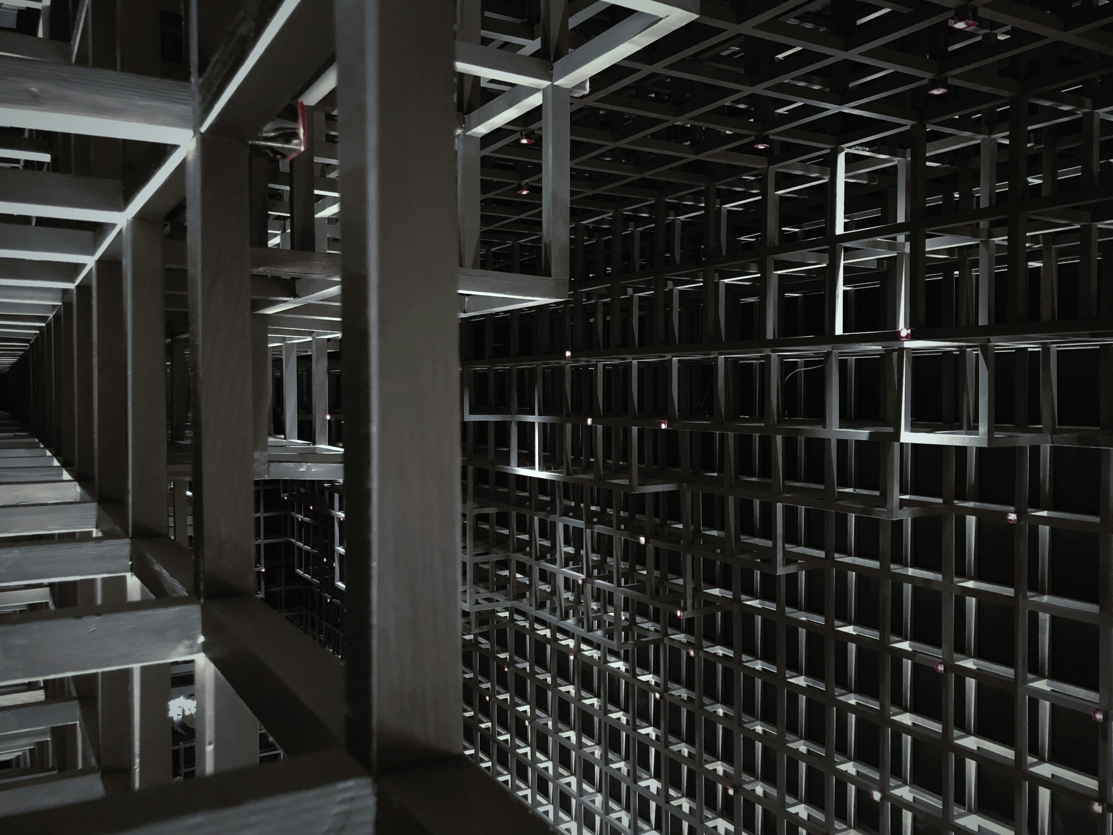 brown wooden shelves with white chairs